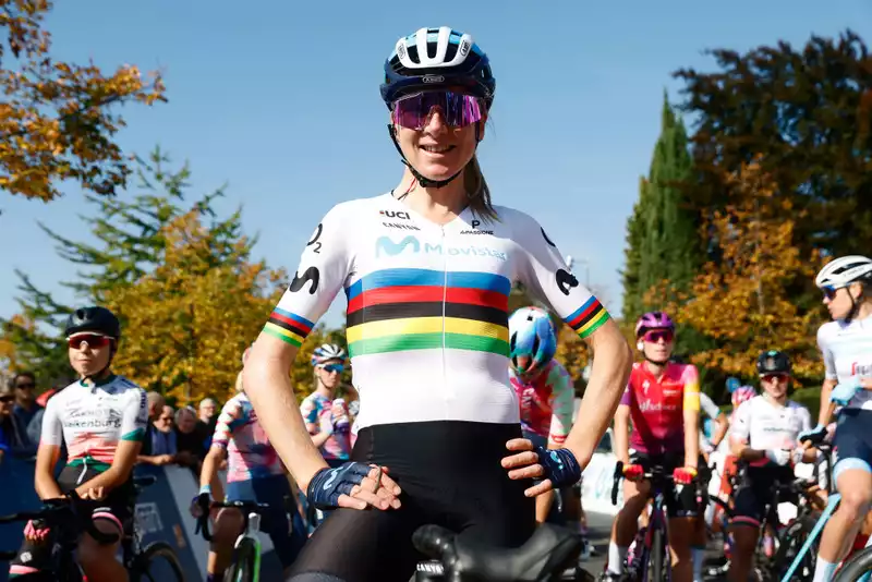 Annemiek van Fruten celebrates the rainbow jersey at the Tour de Romandie.