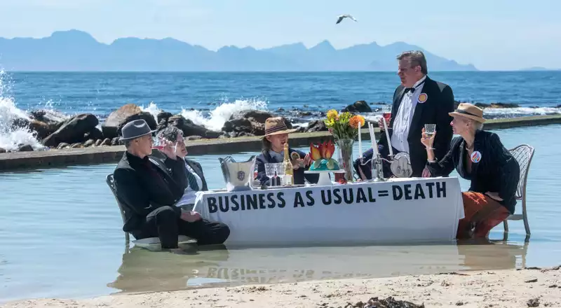 Members of Extinction Rebellion were arrested after protesting against Santos, the sponsor of the Tour Down Under.