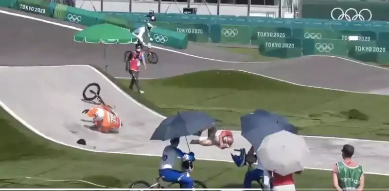 BMX racer crashes into officials entering the Tokyo Olympics course.