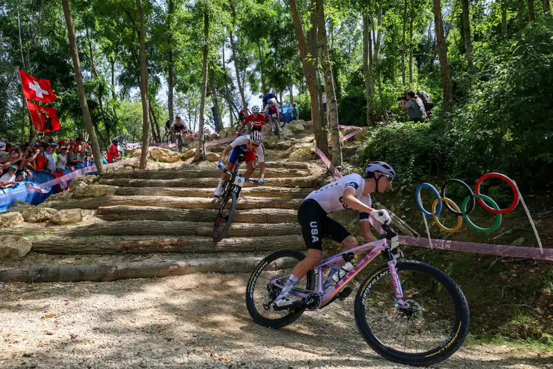 I was on the wheels of a legend" -- Riley Amos makes U.S. history by placing seventh in the Olympic men's cross-country mountain bike race.