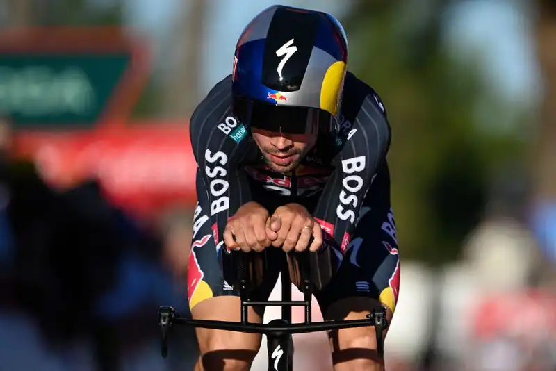 Primoš Roglic smiles in the Vuelta a España time trial despite losing a tooth.